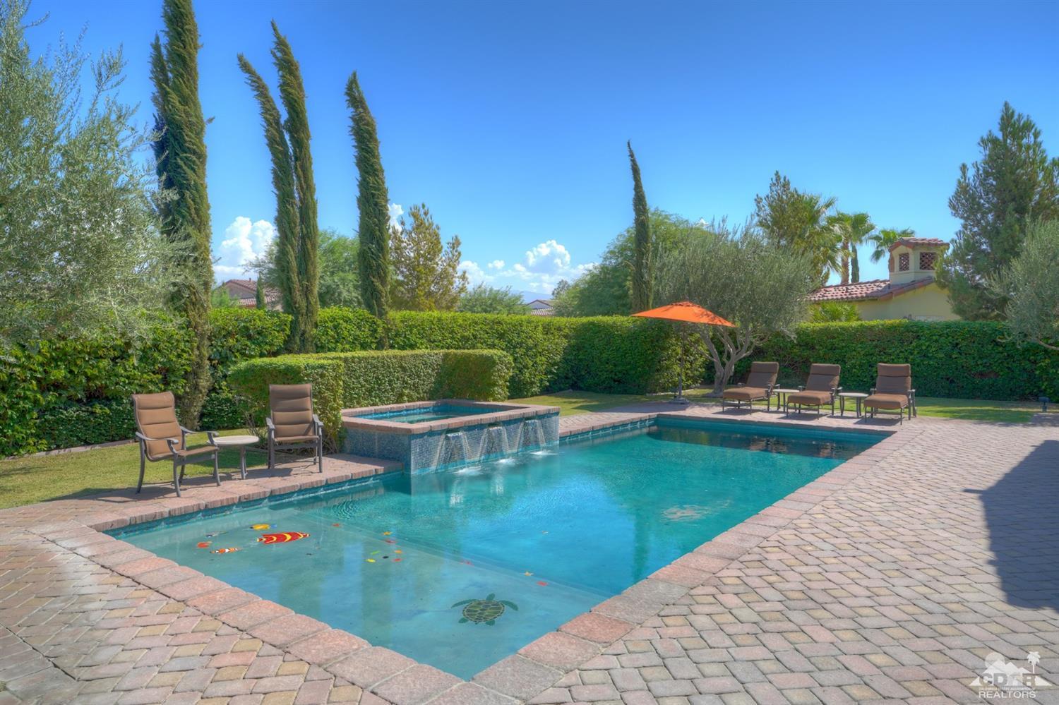 41 Cassis Circle Rancho Mirage, CA 92270 - Photo 39 of 68 a view of a swimming pool with a patio