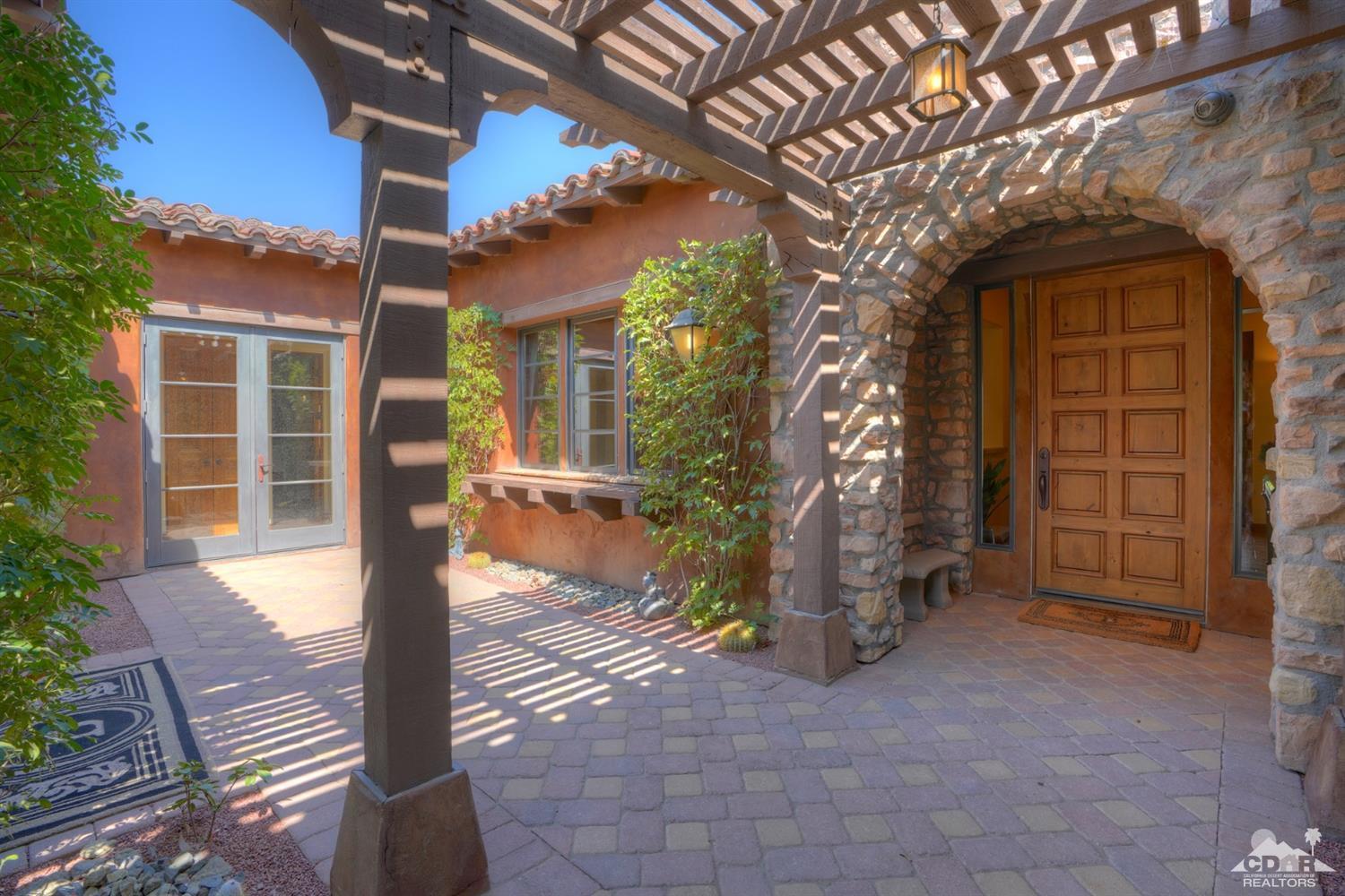 41 Cassis Circle Rancho Mirage, CA 92270 - Photo 6 of 68 a front view of a house