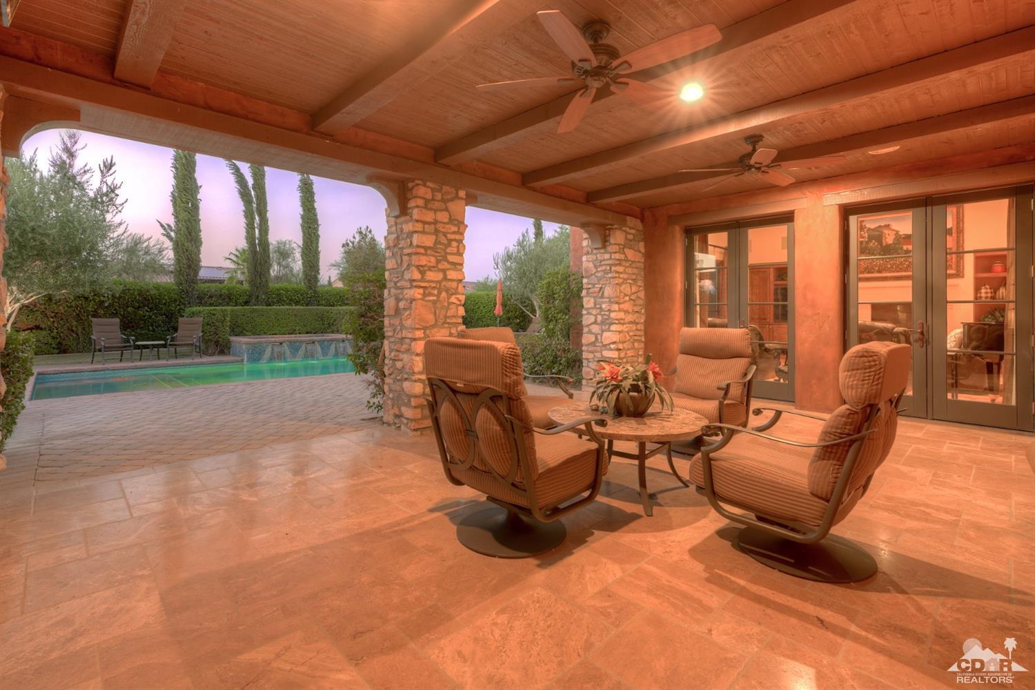 41 Cassis Circle Rancho Mirage, CA 92270 - Photo 54 of 68 a building outdoor space with patio furniture and garden view