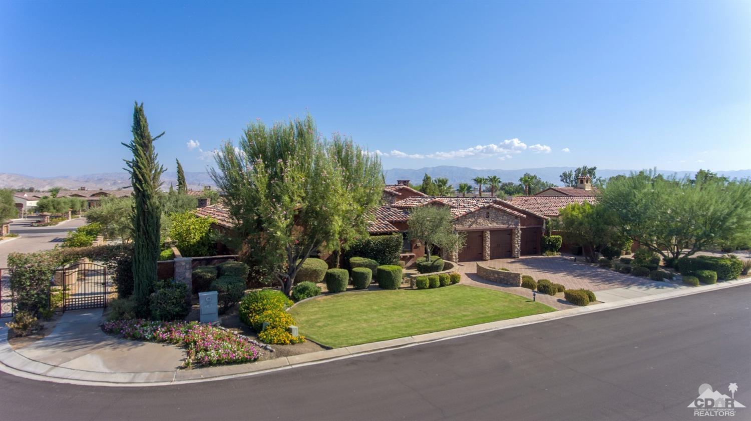 41 Cassis Circle Rancho Mirage, CA 92270 - Photo 64 of 68 a view of a house with a yard and street view