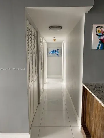 a kitchen with a sink stove and microwave