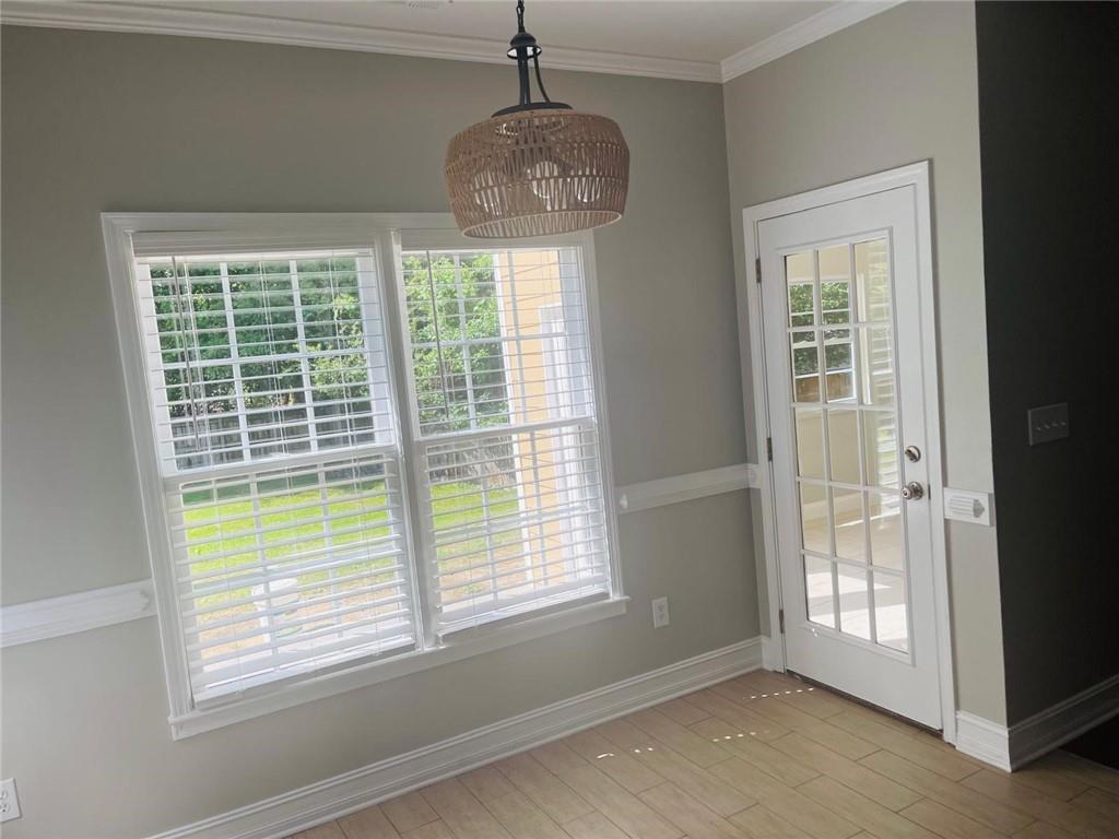 1755 Wheat Grass Way Grayson, GA 30017 - Photo 15 of 42 a front view of a room with large windows