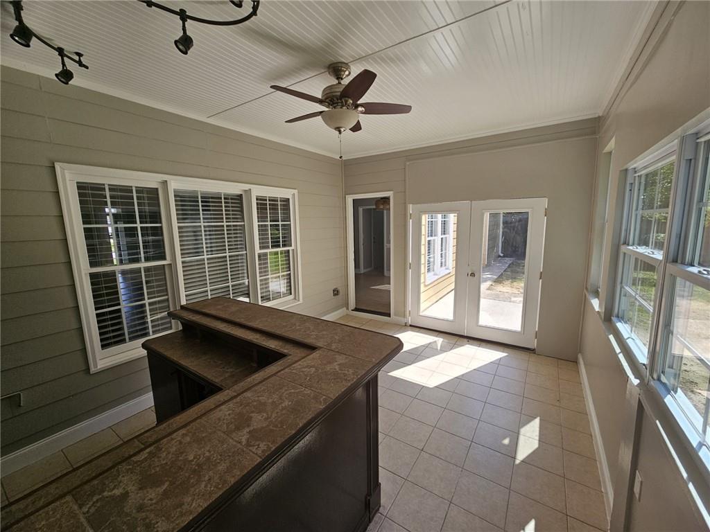 1755 Wheat Grass Way Grayson, GA 30017 - Photo 18 of 42 a view of open kitchen with granite countertop a sink and a refrigerator