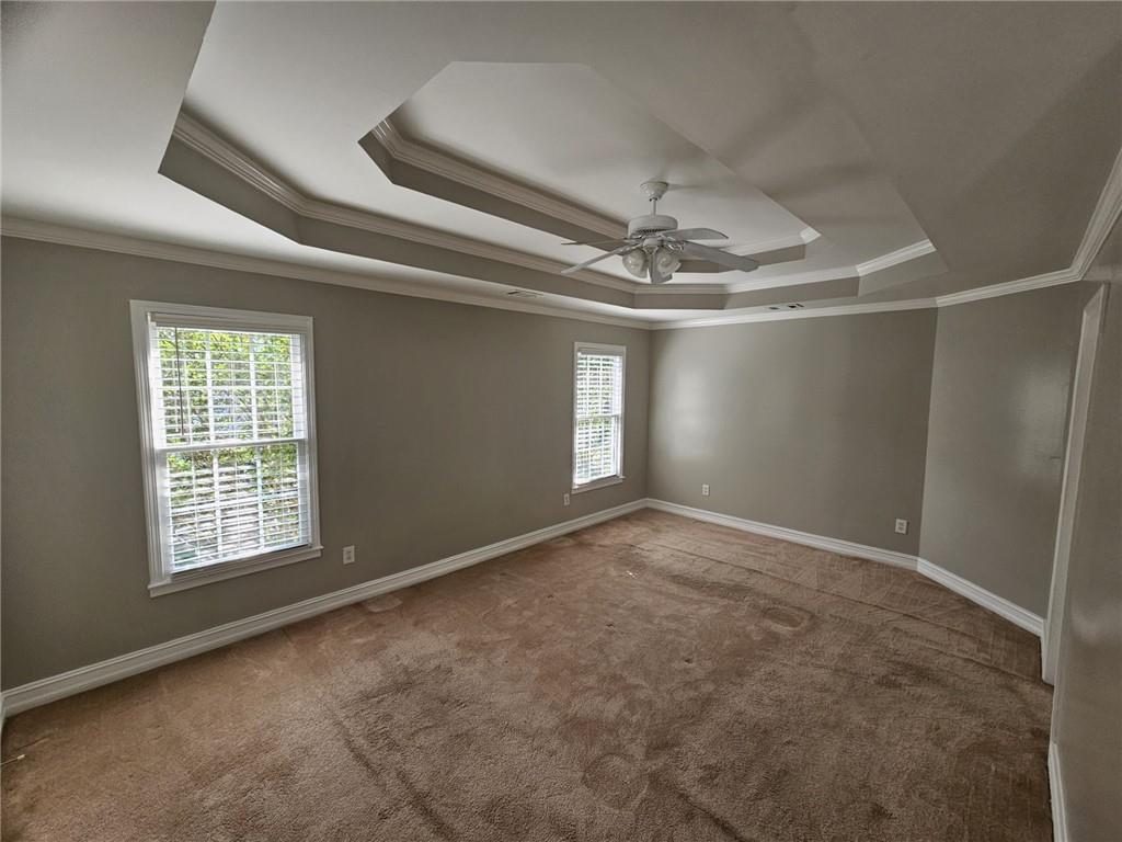 1755 Wheat Grass Way Grayson, GA 30017 - Photo 27 of 42 a view of an empty room with a window