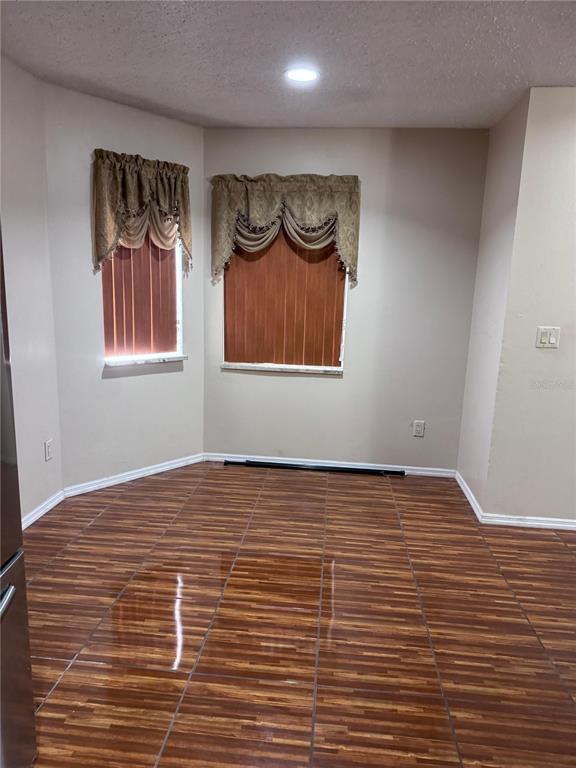 138 Pinewood Circle Kissimmee, FL 34743 - Photo 10 of 26 a view of a livingroom with a window