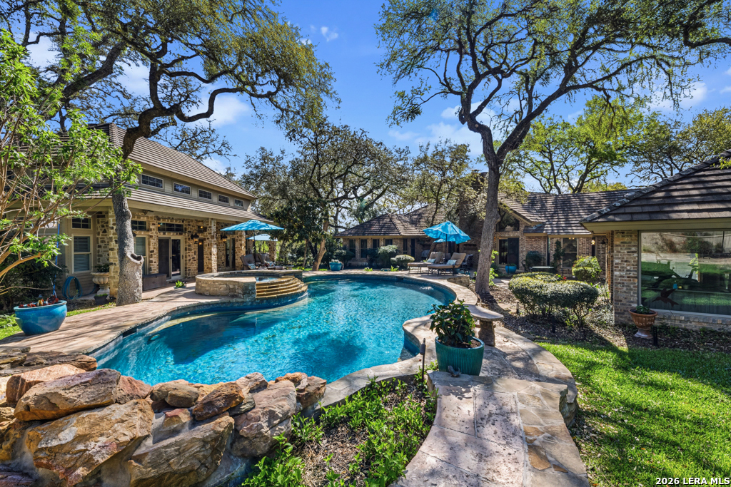 21749 Forest Waters Circle Garden Ridge, TX 78266 - Photo 1 of 50 a view of a swimming pool with a patio