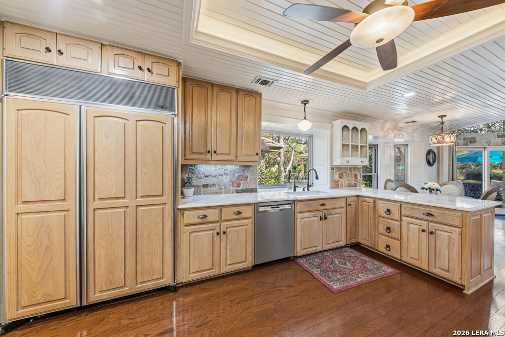 21749 Forest Waters Circle Garden Ridge, TX 78266 - Photo 14 of 50 a kitchen with white cabinets and white appliances