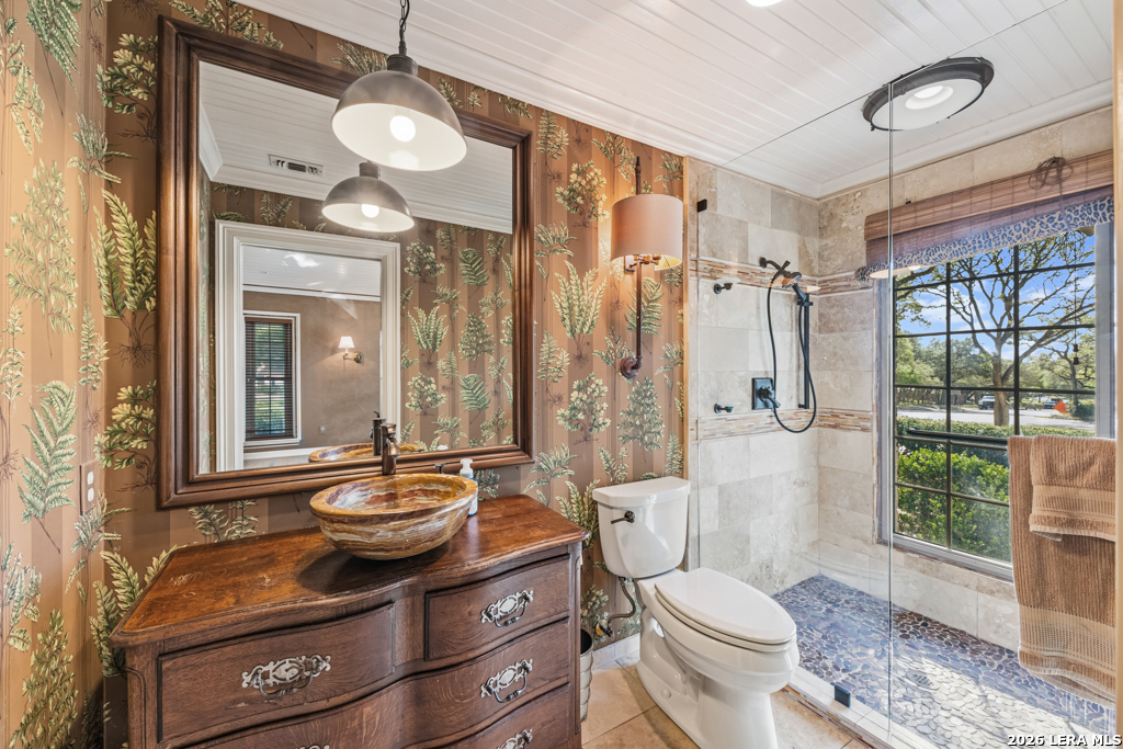 21749 Forest Waters Circle Garden Ridge, TX 78266 - Photo 18 of 50 a bathroom with a sink toilet and shower