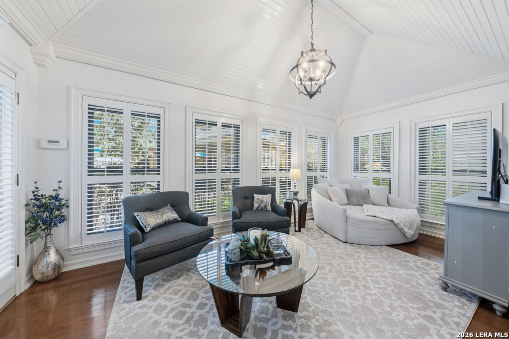 21749 Forest Waters Circle Garden Ridge, TX 78266 - Photo 27 of 50 a living room with furniture chandelier and a large window