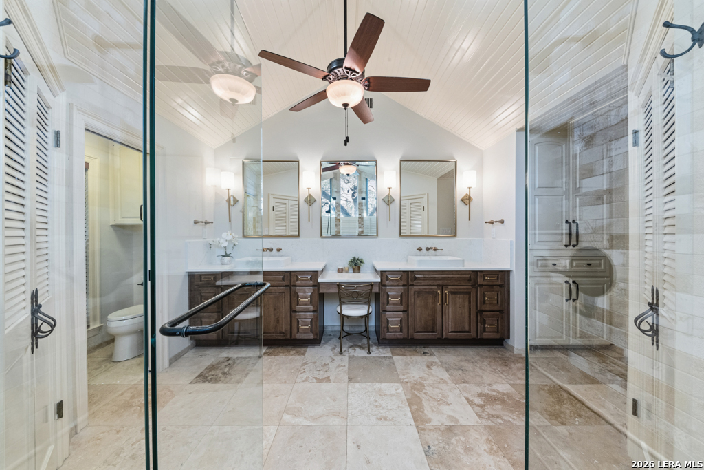 21749 Forest Waters Circle Garden Ridge, TX 78266 - Photo 29 of 50 a bathroom with a sink a vanity and a mirror