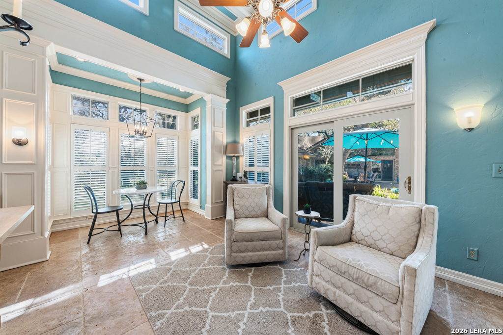 21749 Forest Waters Circle Garden Ridge, TX 78266 - Photo 42 of 50 a living room with furniture and a large window