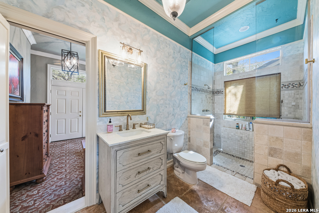 21749 Forest Waters Circle Garden Ridge, TX 78266 - Photo 43 of 50 a bathroom with a double vanity sink mirror and toilet