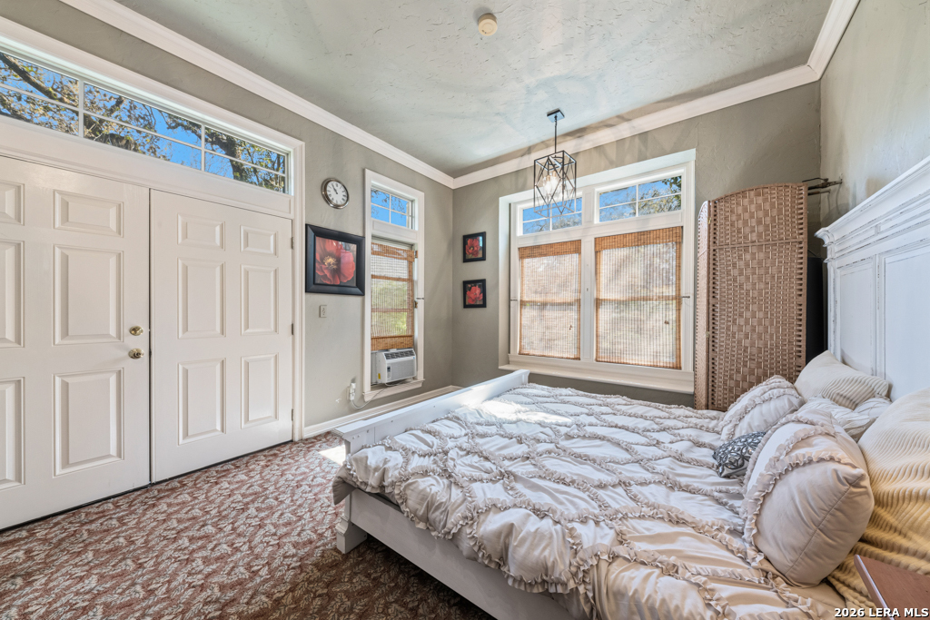 21749 Forest Waters Circle Garden Ridge, TX 78266 - Photo 44 of 50 a bedroom with a bed and a window