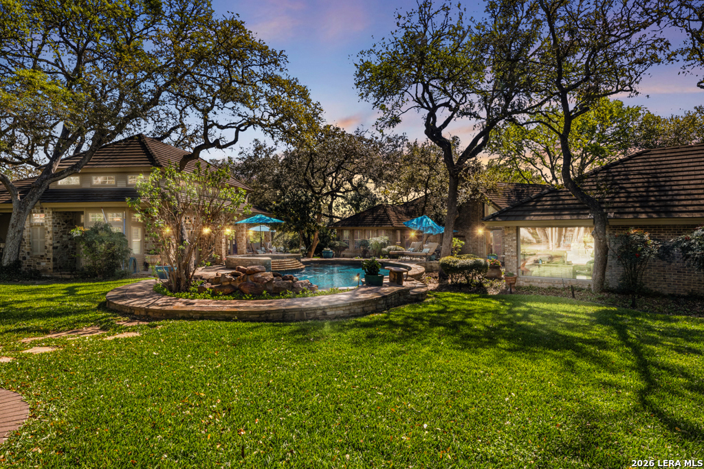21749 Forest Waters Circle Garden Ridge, TX 78266 - Photo 49 of 50 a view of a house with a yard