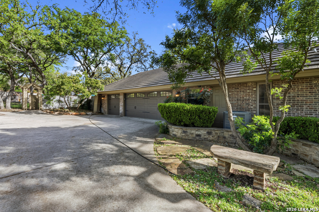 21749 Forest Waters Circle Garden Ridge, TX 78266 - Photo 5 of 50 a view of a chair and table in backyard of the house