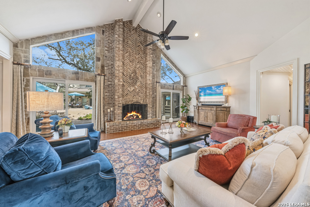 21749 Forest Waters Circle Garden Ridge, TX 78266 - Photo 8 of 50 a living room with furniture and a fireplace