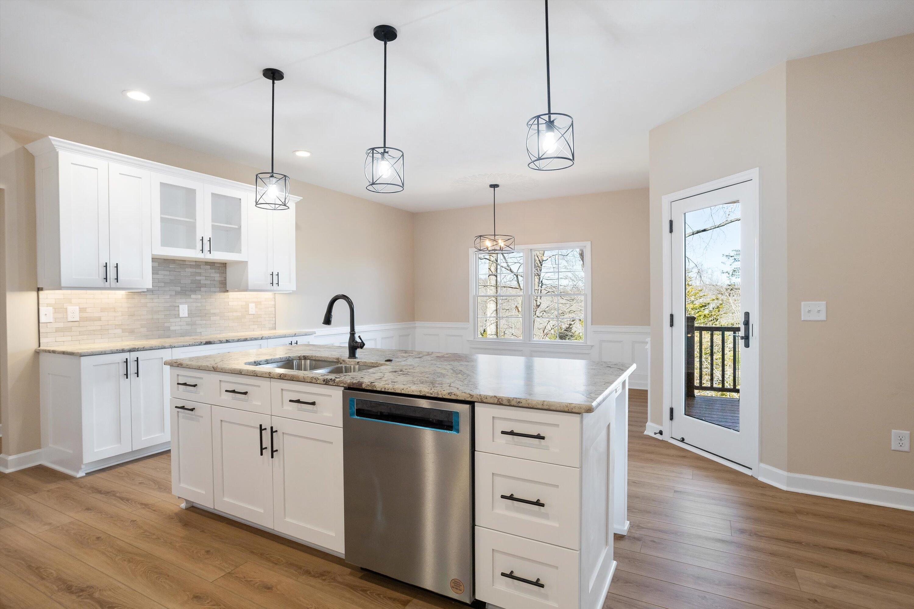 129 Walnut Trace Drive Hardy, VA 24101 - Photo 16 of 42 a kitchen with center island and wooden floor
