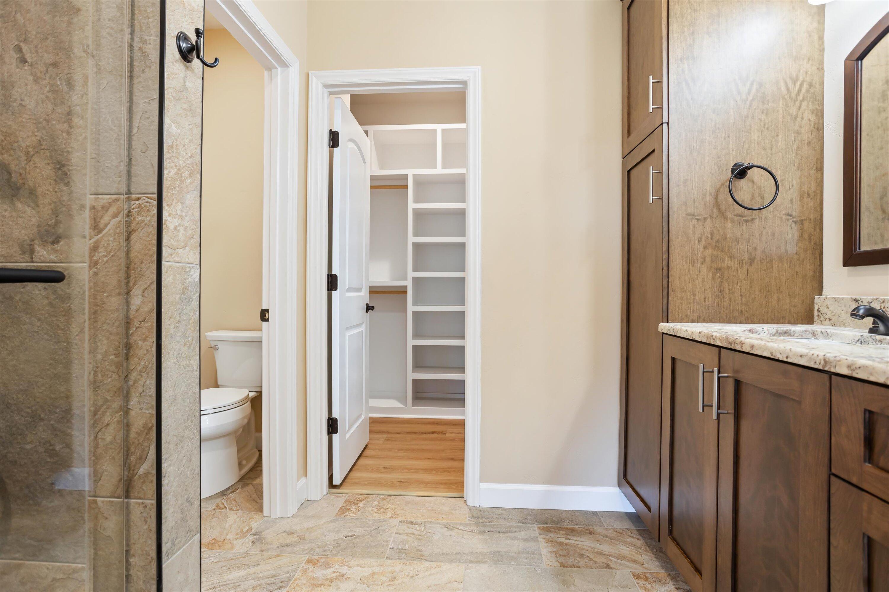 129 Walnut Trace Drive Hardy, VA 24101 - Photo 24 of 42 a bathroom with a granite countertop sink mirror and a toilet