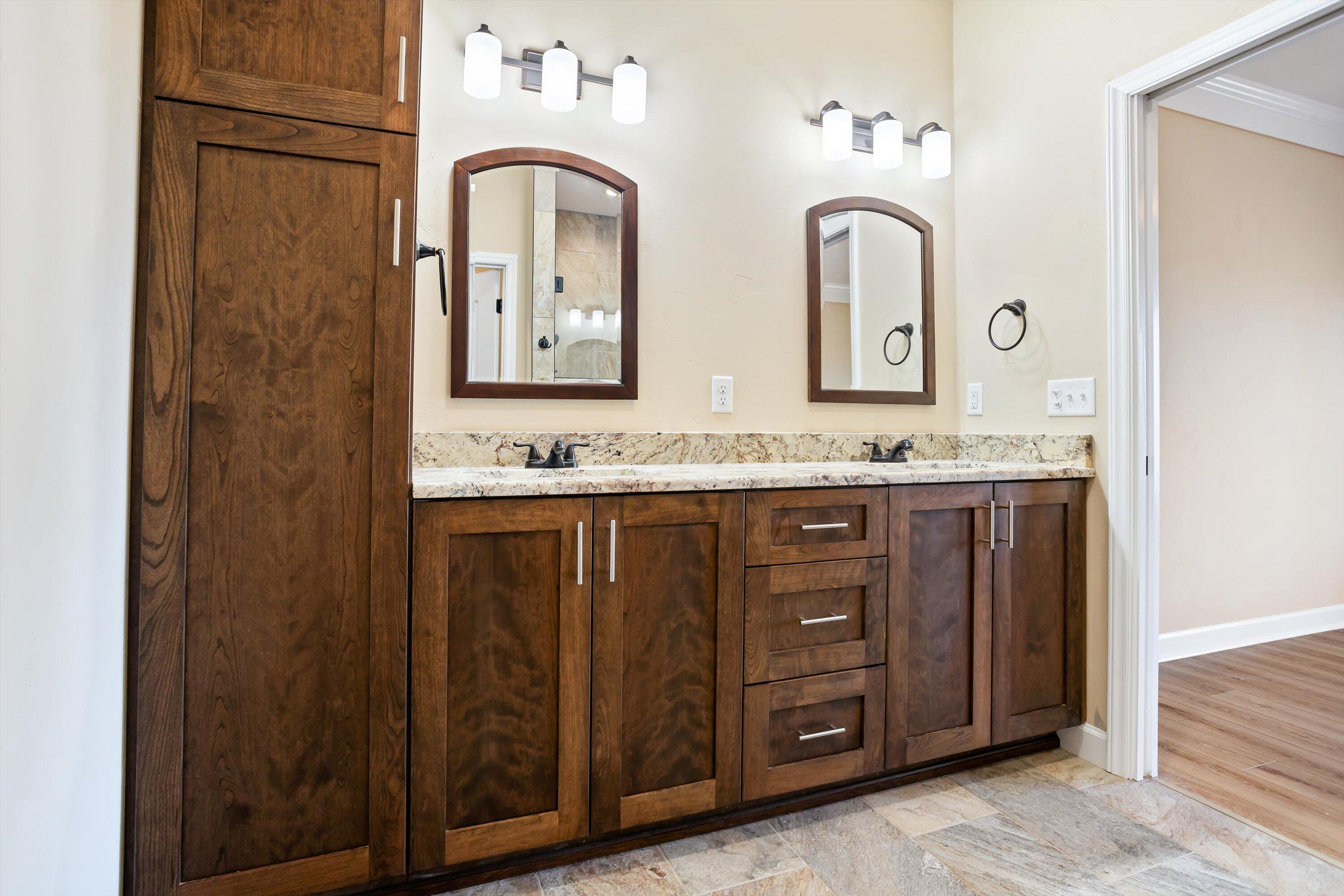 129 Walnut Trace Drive Hardy, VA 24101 - Photo 26 of 42 a bathroom with a granite countertop sink and a mirror