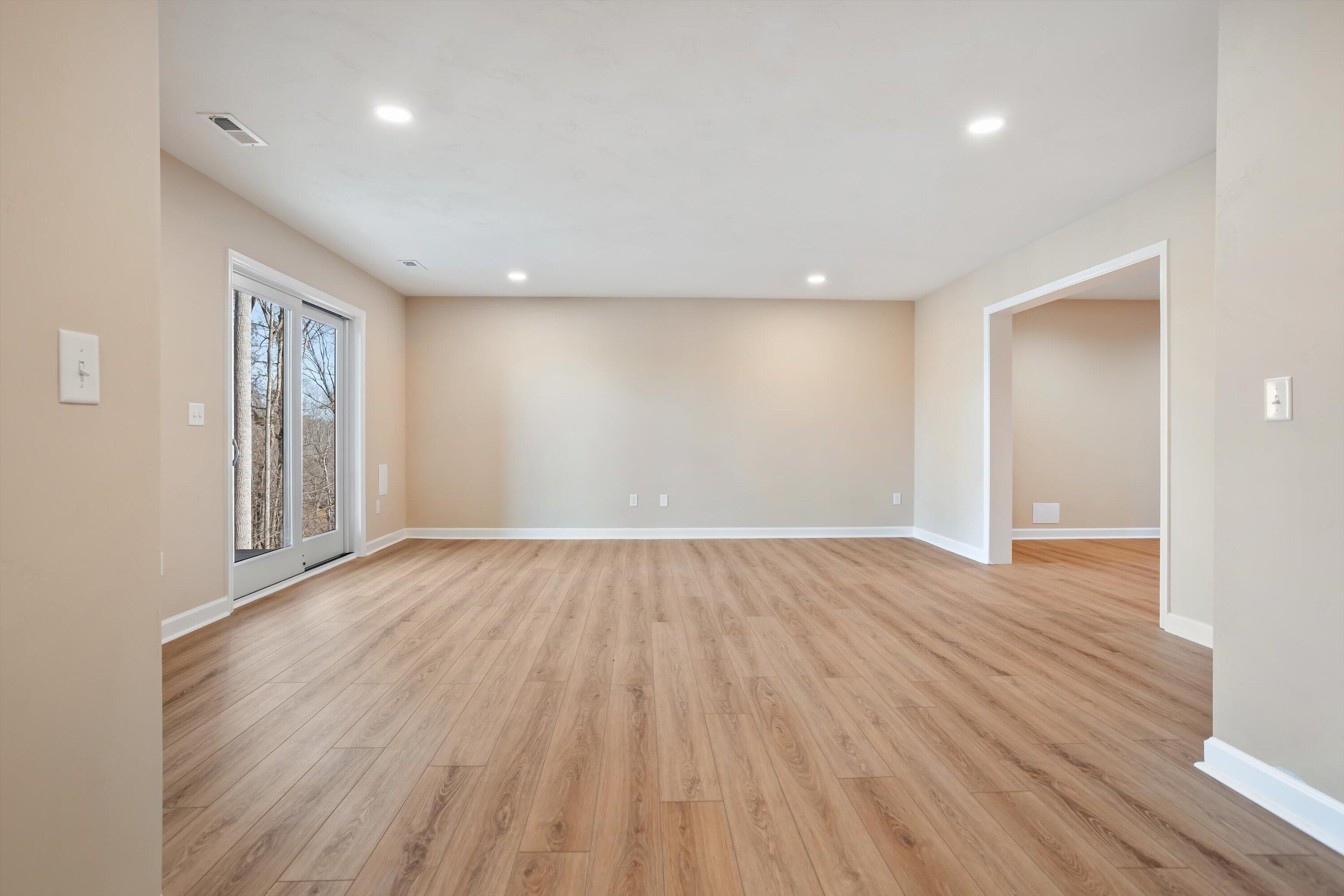 129 Walnut Trace Drive Hardy, VA 24101 - Photo 27 of 42 wooden floor in an empty room with a window