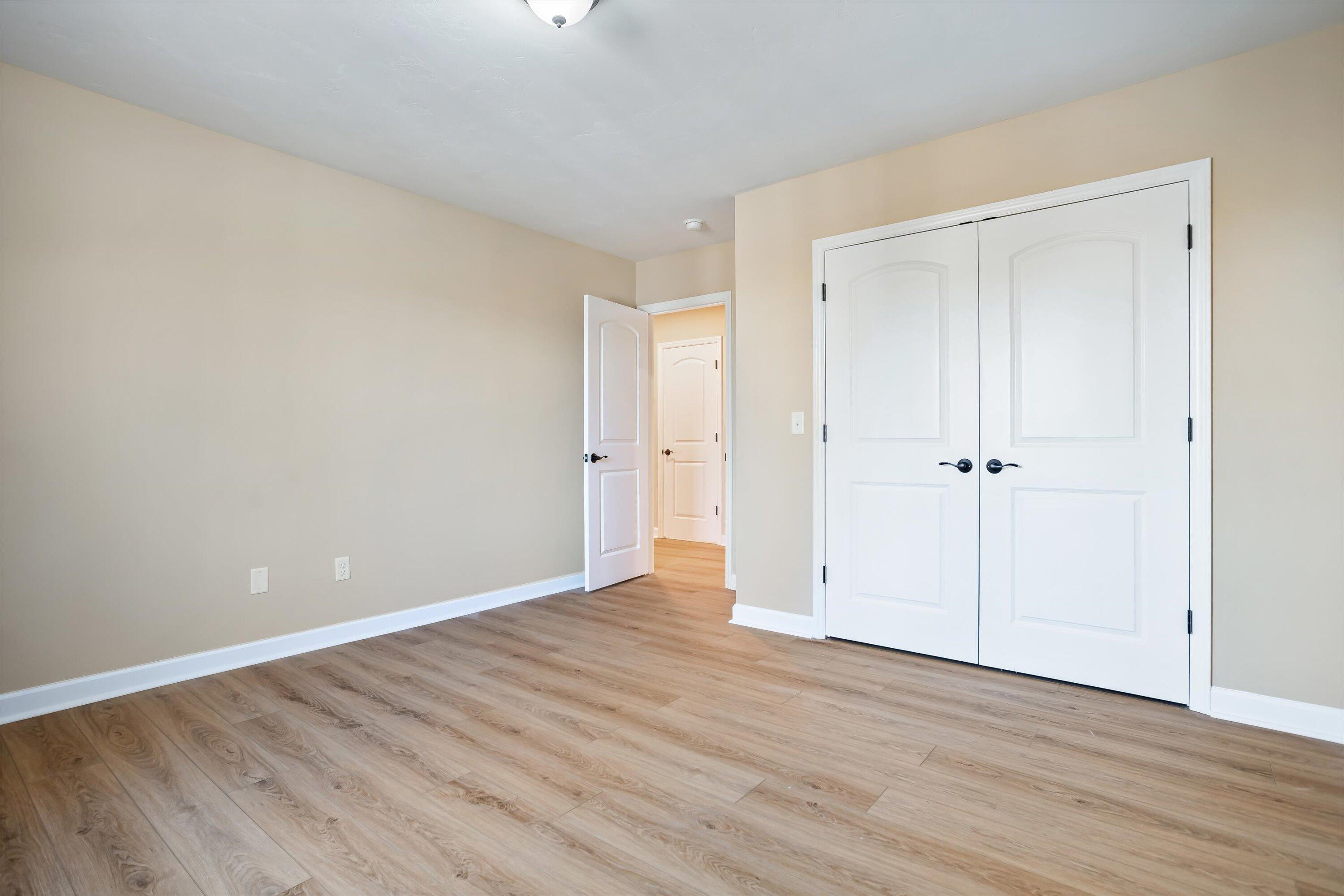 129 Walnut Trace Drive Hardy, VA 24101 - Photo 35 of 42 a view of an empty room with wooden floor