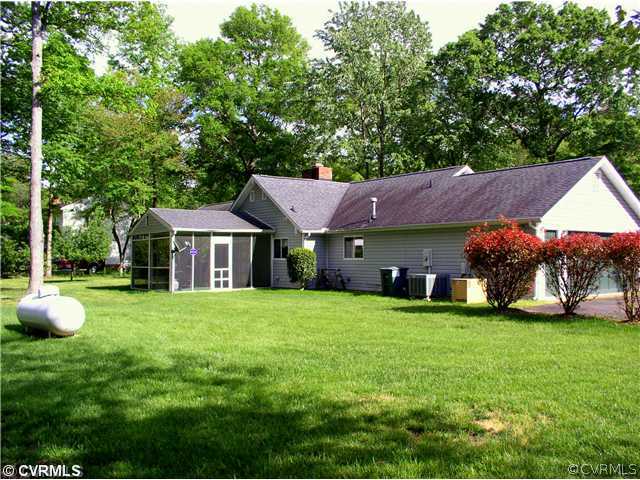 10930 Pegwell Drive Midlothian, VA 23113 - Photo 2 of 12 a view of a house with a yard and sitting area