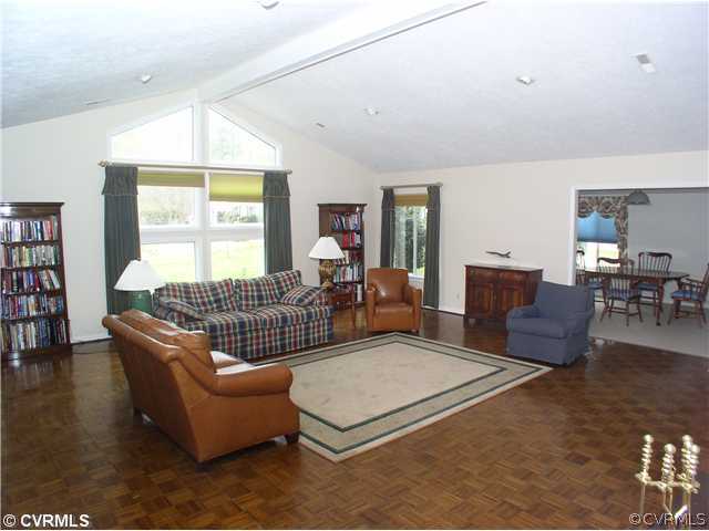 10930 Pegwell Drive Midlothian, VA 23113 - Photo 5 of 12 a living room with furniture rug and window