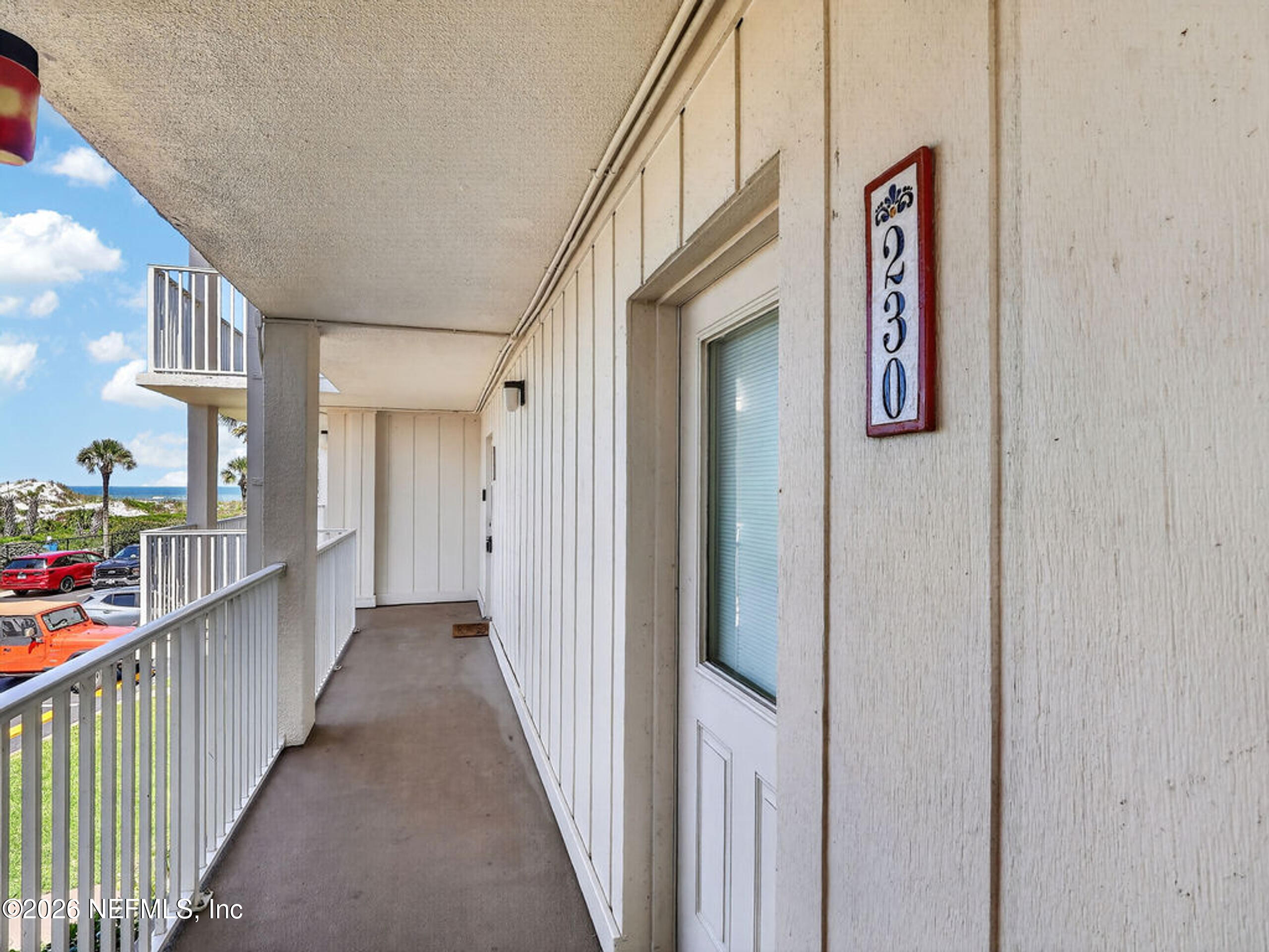 1 Ocean Trace Road, Unit 230 St. Augustine Beach, FL 32080 - Photo 5 of 50 a view of a street from a stairs