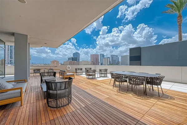 a front view of a building with outdoor space