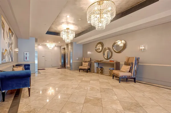 a living room with furniture and a table