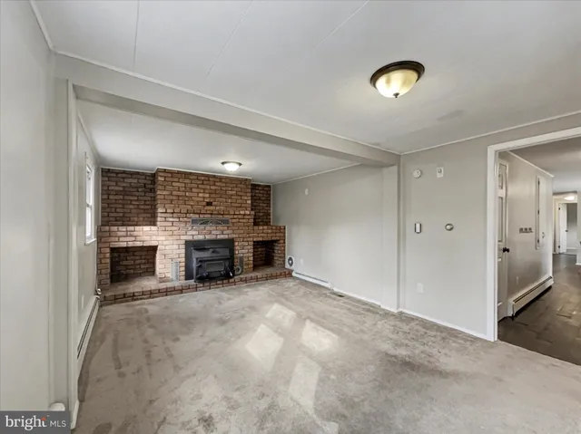 a view of a livingroom with a fireplace
