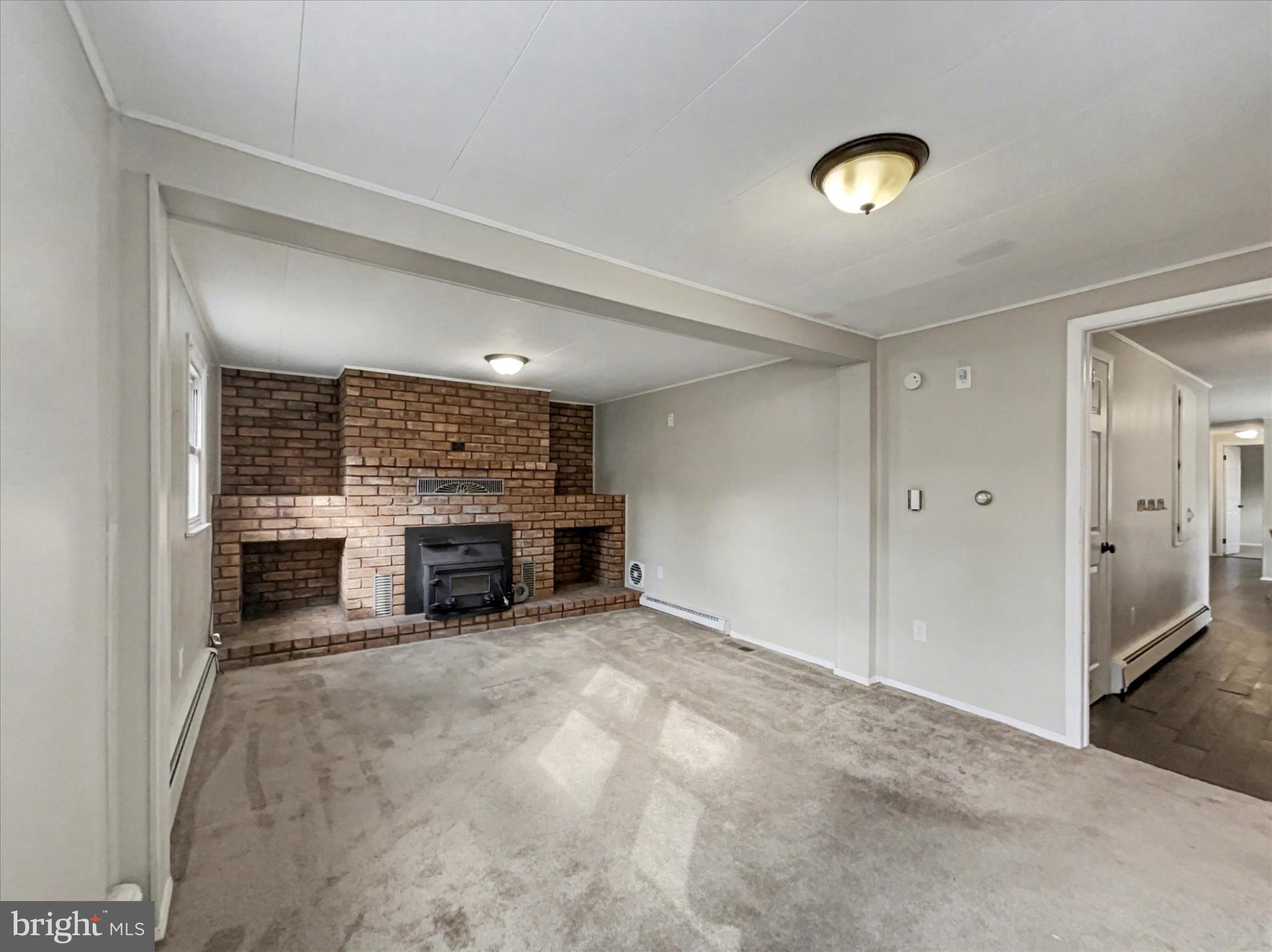 4968 Fairfield Road Fairfield, PA 17320 - Photo 16 of 32 a view of a livingroom with a fireplace