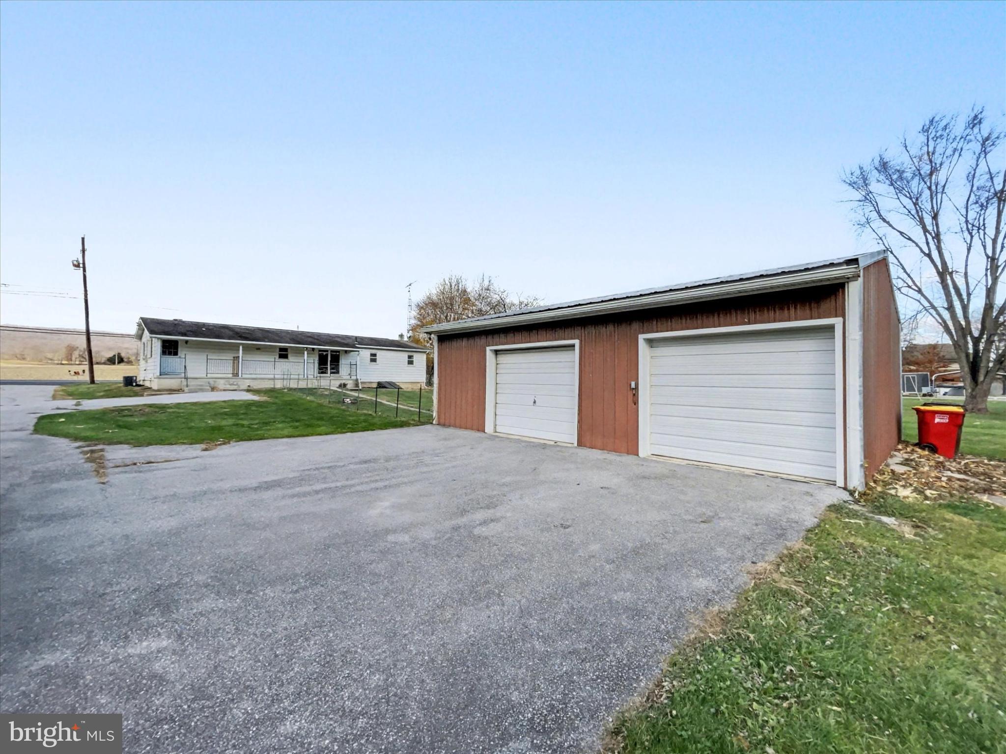 4968 Fairfield Road Fairfield, PA 17320 - Photo 25 of 32 a house with a yard and parking space