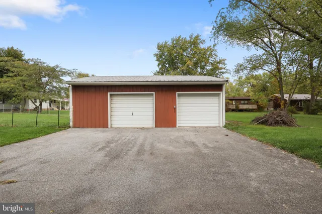 a house view with a garden space