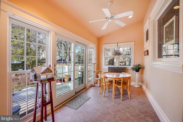 a bedroom with furniture and window