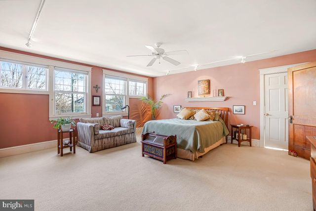 a view of hallway with furniture and toys