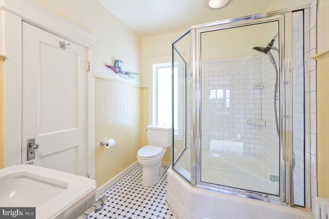 a workspace with furniture and a bookshelf