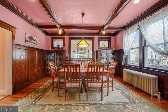 a kitchen with granite countertop a stove and cabinets
