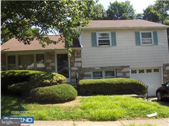 369 Ainslie Road Abington, PA 19006 - Photo 1 of 8 a view of a house with a backyard