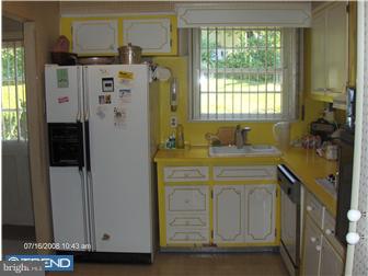 369 Ainslie Road Abington, PA 19006 - Photo 6 of 8 a bathroom with a sink a mirror and shower
