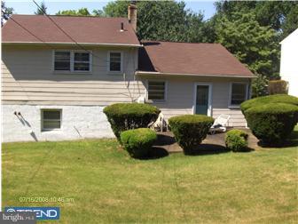 369 Ainslie Road Abington, PA 19006 - Photo 7 of 8 a front view of a house with yard and outdoor seating