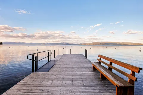 a view of wooden floor with a lake
