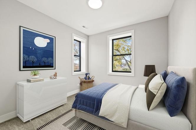 6223 North Albany Avenue, Unit C Chicago, IL 60659 - Photo 5 of 10 a bedroom with a bed and wooden floor