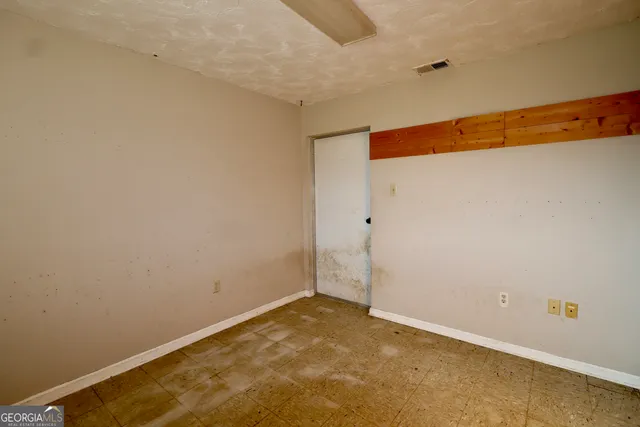 an empty room with a window