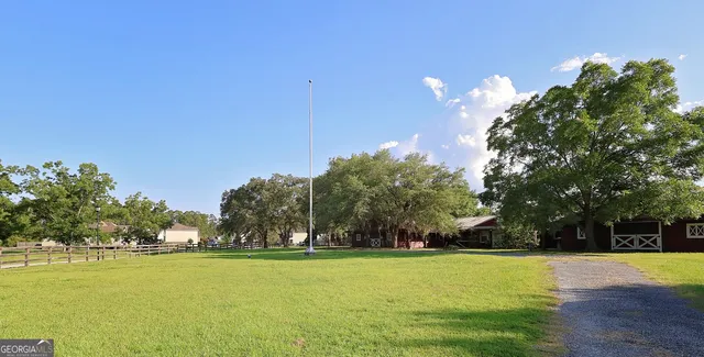 a view of a golf course with a lake