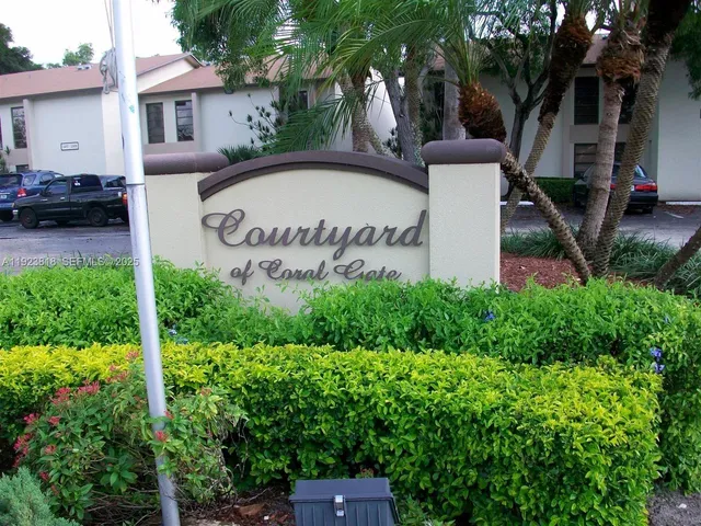 a view of a house with a garden