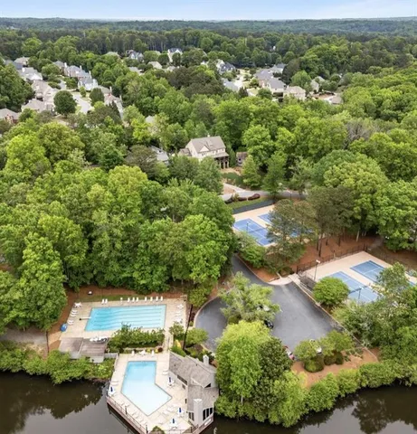 a view of a chair and table in the balcony