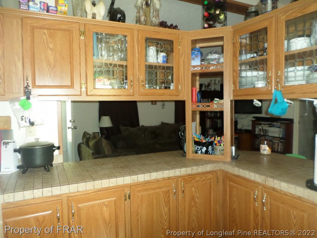 552 Lakerun Drive Bunnlevel, NC 28323 - Photo 11 of 31 a kitchen with a sink and a window