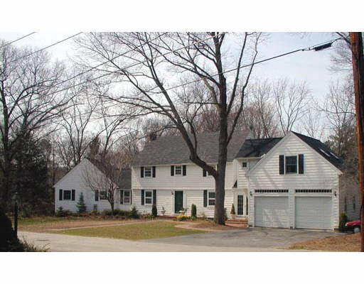 8 Fuller Road Wellesley, MA 02481 - Photo 1 of 1 a front view of a house with a yard