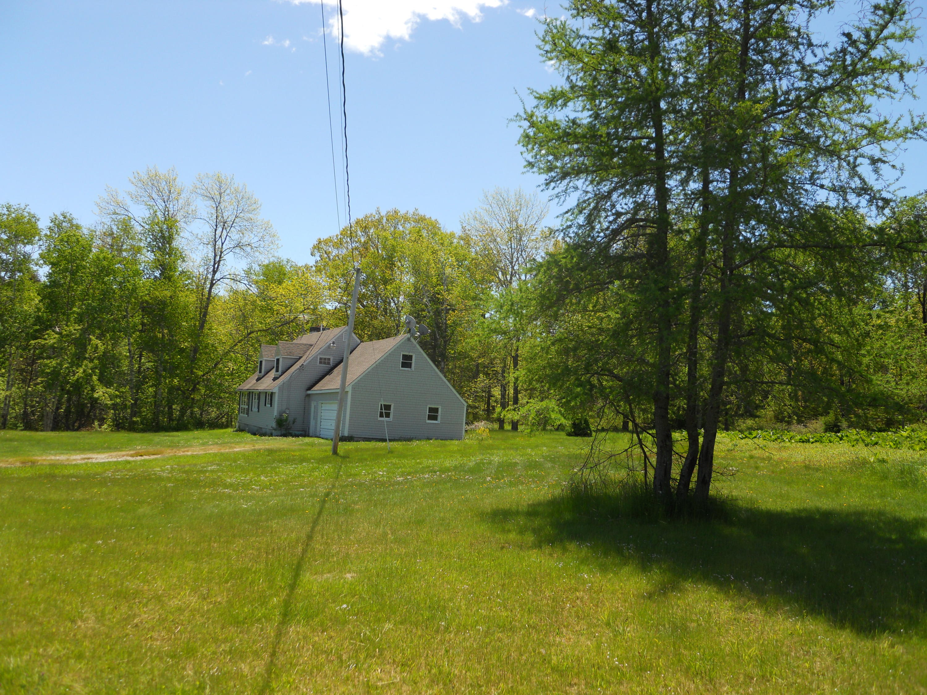 165 Hewes Point Road Islesboro, ME 04848 - Photo 5 of 32 HouseFromRoadDSCN0268